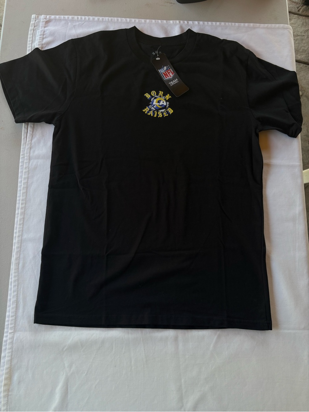 NFL Black Short Sleeve Tee with Small Yellow & Blue Logo